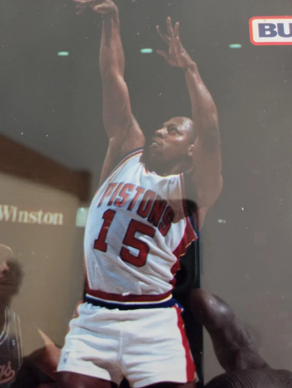 Framed display feat a vintage action photo of Detroit Pistons Vinnie Johnson
